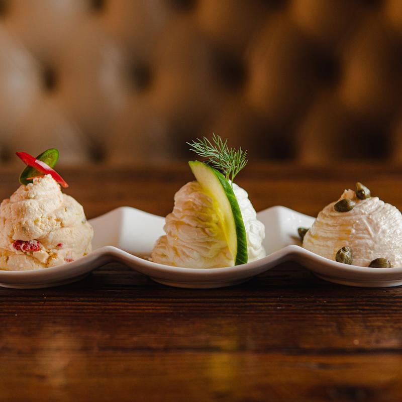 Trio of dips with cucumber and capers